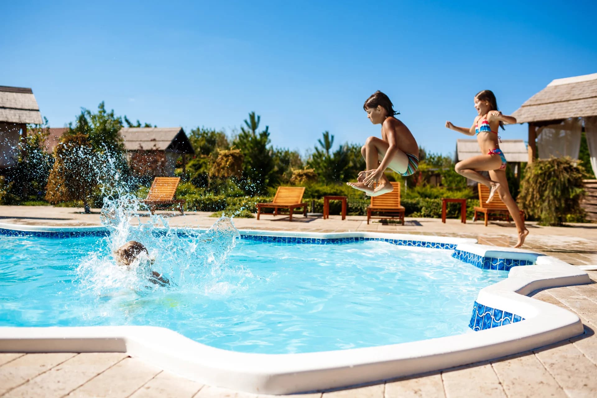Florida family enjoying their fiberglass pool installation - Cool Pool packages